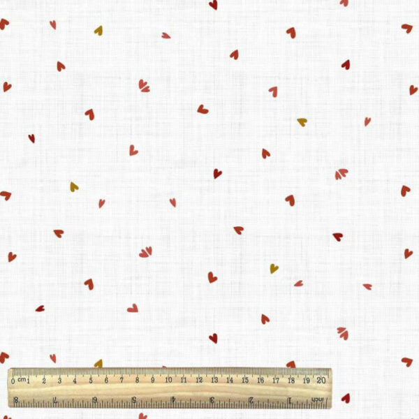 chadwick red hearts on white cotton jersey fabric with ruler