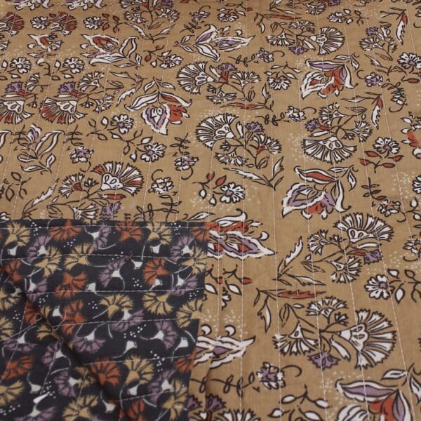 Quilted double sided cotton fabric in elegant rich tones of brown floral design